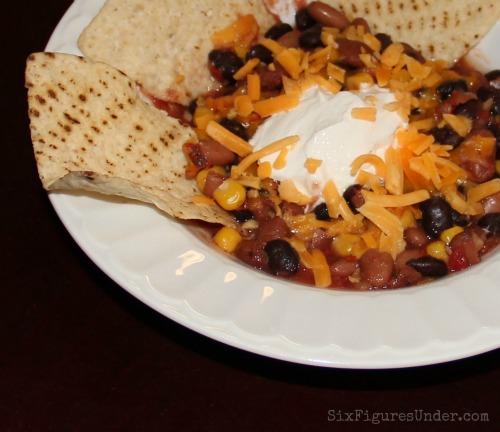 Taco soup is a favorite frugal dinner for our family. I love that it's not just a bunch of canned goods, but it's seriously just as fast. The best part is it's even cheaper and healthier than its canned good counterpart! You can add meat, but we eat it meatless.