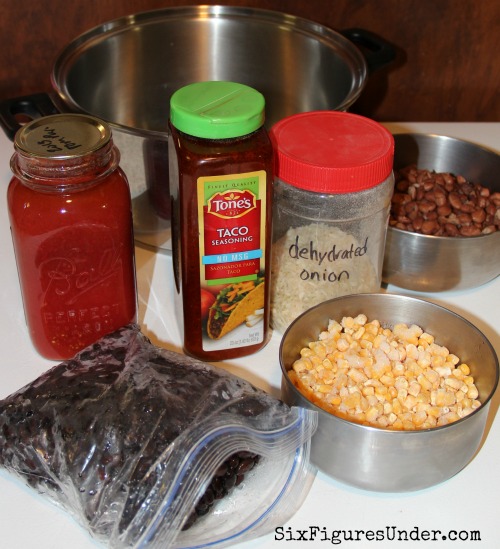 Taco soup is a favorite frugal dinner for our family. I love that it's not just a bunch of canned goods, but it's seriously just as fast. The best part is it's even cheaper and healthier than its canned good counterpart! You can add meat, but we eat it meatless.